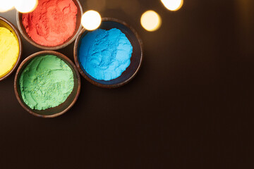 Canvas Print - Closeup view of colorful Holi powder on the bowl