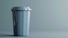 A Gray Office Bucket On An Isolated Background For Used Paper And Trash. The Concept Of Proper Sorting And Storage Of Waste For Further Processing.