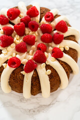 Wall Mural - Creamy Bliss - White Chocolate Raspberry Bundt Cake with Frosting