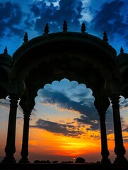 Wall Mural - Indian arch silhouette in old temple at dramatic dark blue sunset sky background. Free space for text - generative ai