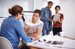 © Hover/peopleimages.com - Business people, blueprint or brainstorming with conversation, planning or review with project. Collaboration, group or teamwork with documents or discussion with meeting or feedback with cooperation