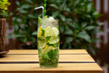 Fototapeta Tulipany - summer refreshing mojito cocktail with lime and mint