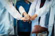 © NanSan - A dedicated team of doctors and healthcare professionals working collaboratively in a hospital setting, ensuring quality patient care with expertise and compassion.