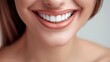 © Ilja - Smiling asian indian model with clean teeth in closeup dental ad portrait on defocused background