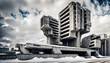 large concrete retro futuristic brutalist apartment building in a snow covered urban landscape