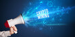 © ra2 studio - Young woman shouting in megaphone, technology announcement concept