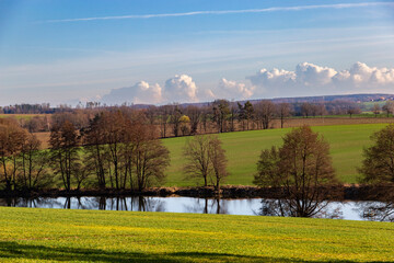 Wall Mural - Scenic landscape with fields and river early spring