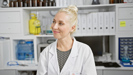 Poster - Cheerful young blonde woman scientist, beaming with confidence, caught in a candid moment, looking off to the side in her bustling lab.