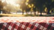 © chelmicky - Empty podium set up in a beautiful outdoor picnic scene, perfect for celebrations and events