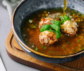 Wall Mural - almond meatball soup on top view