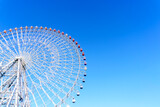 Fototapeta  - Tempozan ferris wheel in Kaiyukan, Osaka, Japan. Popular tourist destination.