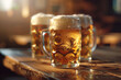 Mugs of light beer with foam and water drops on a wooden bar counter, selective focus with space for text.
