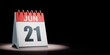 June 21 Calendar Spotlighted on Black Background