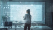 A female entrepreneur brainstorming ideas on a digital whiteboard projected onto the wall of her sleek office space. 8K -