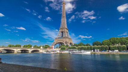 Wall Mural - The Eiffel tower timelapse hyperlapse from waterfront at the river Seine in Paris