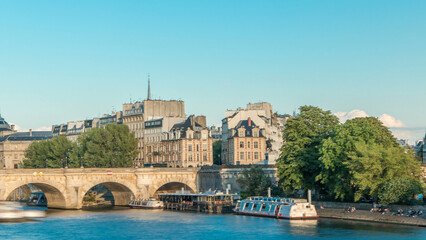 Wall Mural - Sunset timelapse over Seine river, Pont Neuf bridge and Cite island with Royal palace. Paris, France