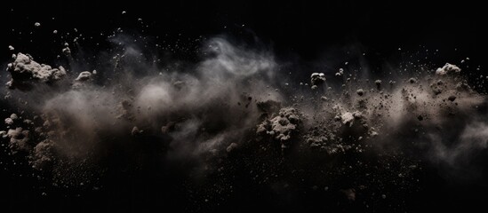 Wall Mural - A dark sky filled with cumulus clouds releasing smoke, creating a mysterious and atmospheric midnight event. The black background enhances the dramatic meteorological phenomenon