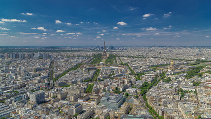 Sticker - Aerial view from Montparnasse tower with Eiffel tower and La Defense district on background timelapse in Paris, France.