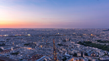 Wall Mural - Panorama of Paris after sunset day to night timelapse. Top view from montparnasse building in Paris - France