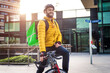 © oneinchpunch - Food delivery rider on his bicycle.