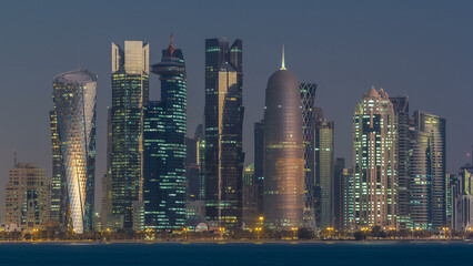 Wall Mural - Skyline of Doha night to day transition timelapse in Qatar