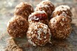 Raw energy balls crafted from dates, nuts, and coconut flakes, symbolizing Earth Day's emphasis on raw, unprocessed foods that honor the Earth's natural bounty.