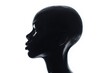 Silhouette of a woman's head against a plain white background. Suitable for various design projects