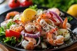 A black plate with shrimp and assorted vegetables. Perfect for restaurant menus or healthy eating concepts