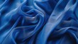 Close up view of blue fabric. Ideal for textile backgrounds
