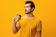 © SHOTPRIME STUDIO - Man happy coffee drink hipster t-shirt paper copy mug studio tea hot energy space cup