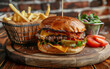 © CHPhotos - tasty double cheesburger, served on a wooden plate, with a Serving basket full of fries, and a side salat