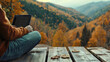 © Nemanja - Man using the laptop or notebook device outdoors in the wilderness, autumn or fall forest landscape, remote work or freelancing on a holiday or a vacation. Digital nomad traveling freedom, copy space