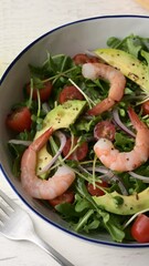 Wall Mural - shrimp salad with tomato and avocado