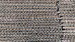 © Maule - Stacked layers of corrugated cardboard displaying the material's fluted interior texture.