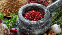 A Mortar And Pestle B With Crushed Red Berries Surrounded By A Variety Of Dried Es And Ingredients.