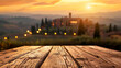 Wooden board of free space for your decoration. Blurred sunrise background.