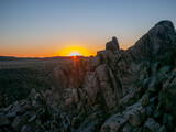 Fototapeta Natura - Sun is about to rise up behind the rocks