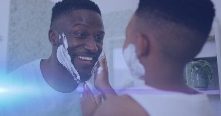 Poster - Image of lights over happy african american father and son shaving and having fun