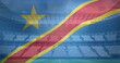 Image of waving flag of democratic republic of the congo over sport stadium