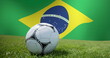 Image of waving flag of brazil over football ball