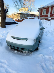 Poster - A car near the road covered with snow. Winter