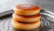 Japanese dorayaki is a bean paste pancake on a white background