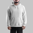 White hoodie mockup on bearded man, oversized sweatshirt with pocket, for design, branding, front view.