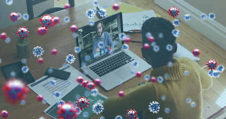 Poster - Image of covid 19 cells over businesswoman on laptop image call