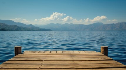 Poster - A wooden pier sits on the edge of a lake, with mountains in the background