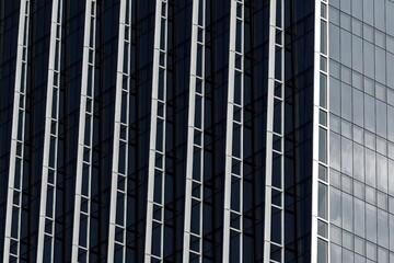 Modern office building exterior. Abstract glass windows