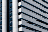 Fototapeta Perspektywa 3d - Skyscrapper with abstract windows. Modern architecture facade