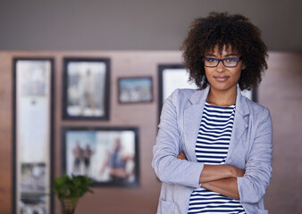 Home office, portrait and confident businesswoman with glasses, pride and professional at window. Female person, business and woman with arms crossed for break or startup and entrepreneur indoors