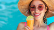 © Yuwarin - portrait of beautiful young woman drinking juice on summer colorful background