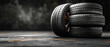 Car tires on black background with copy space, an illustrative concept for auto parts business and car repair shop.Generative AI